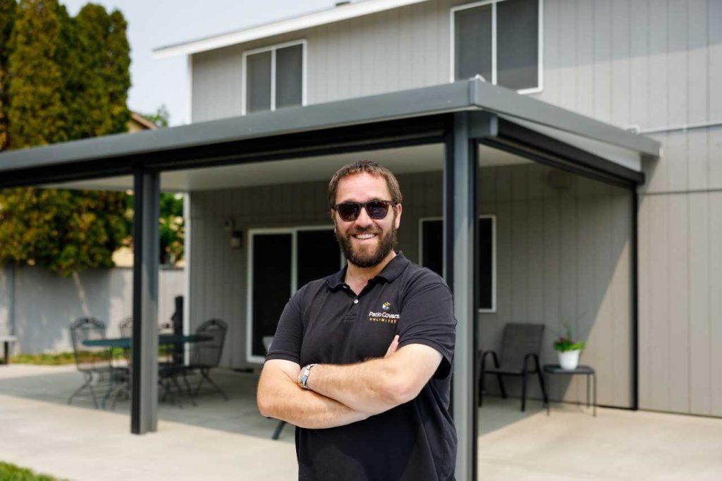 Ryan Rodan in front of custom patio cover from PCUNW